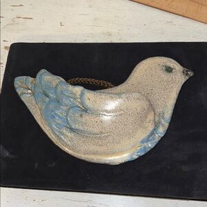 Handmade Salamander Pottery hanging wall pocket bird